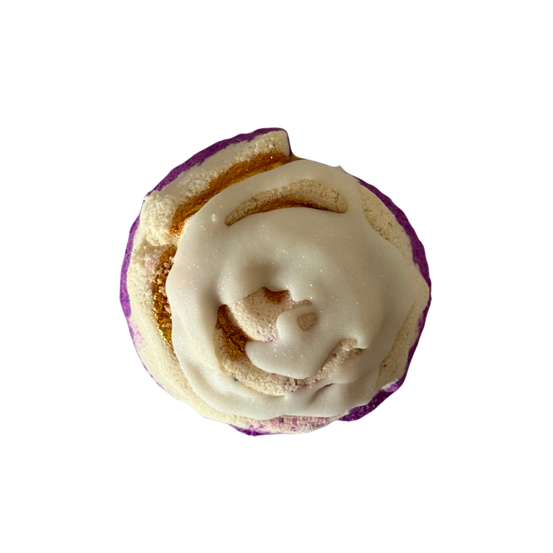 Cinnamon  bun bath bomb filled with a hidden colour. All hand painted. Vegan friendly. Australian Small business.