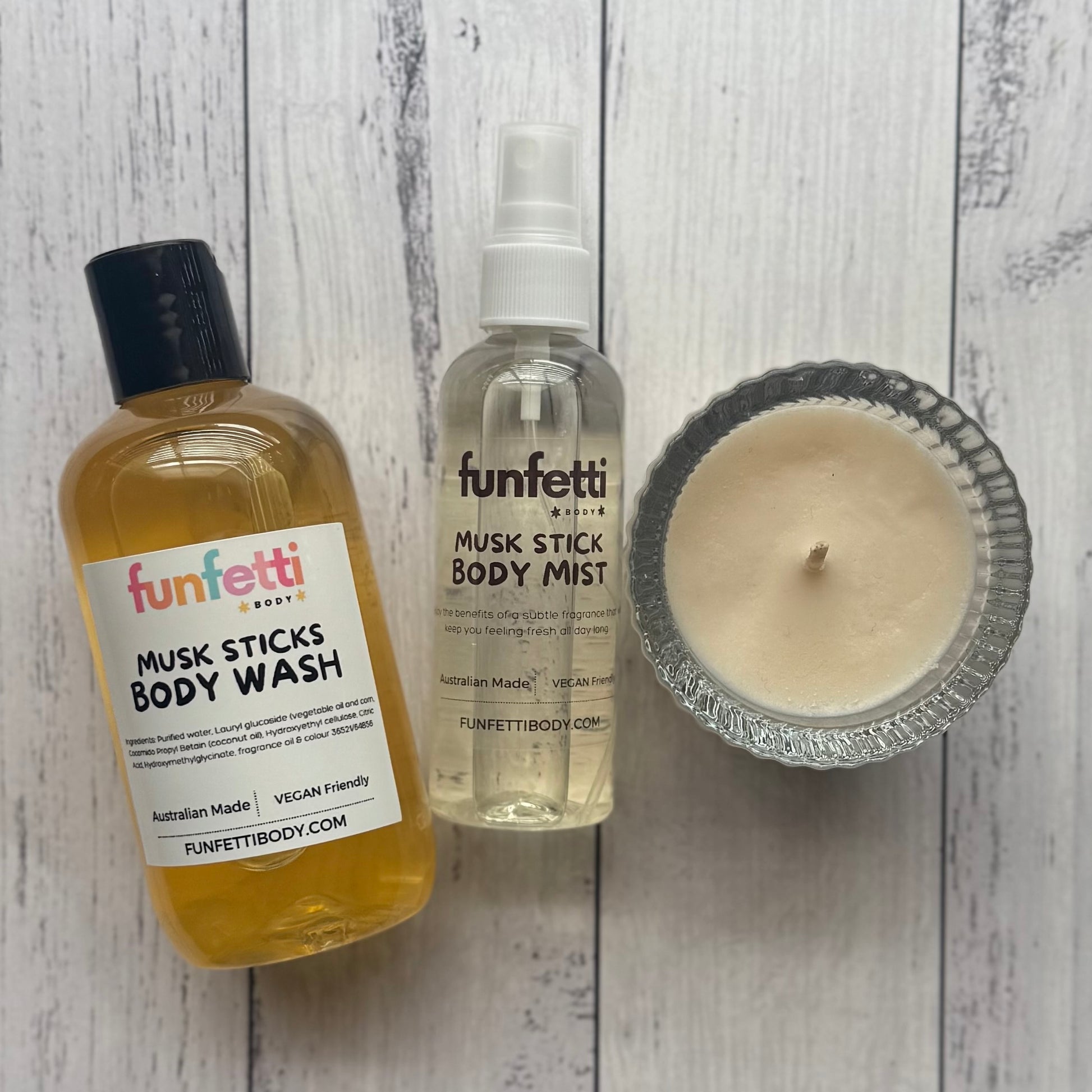 Three skincare products from Funfetti Body on a wooden surface.